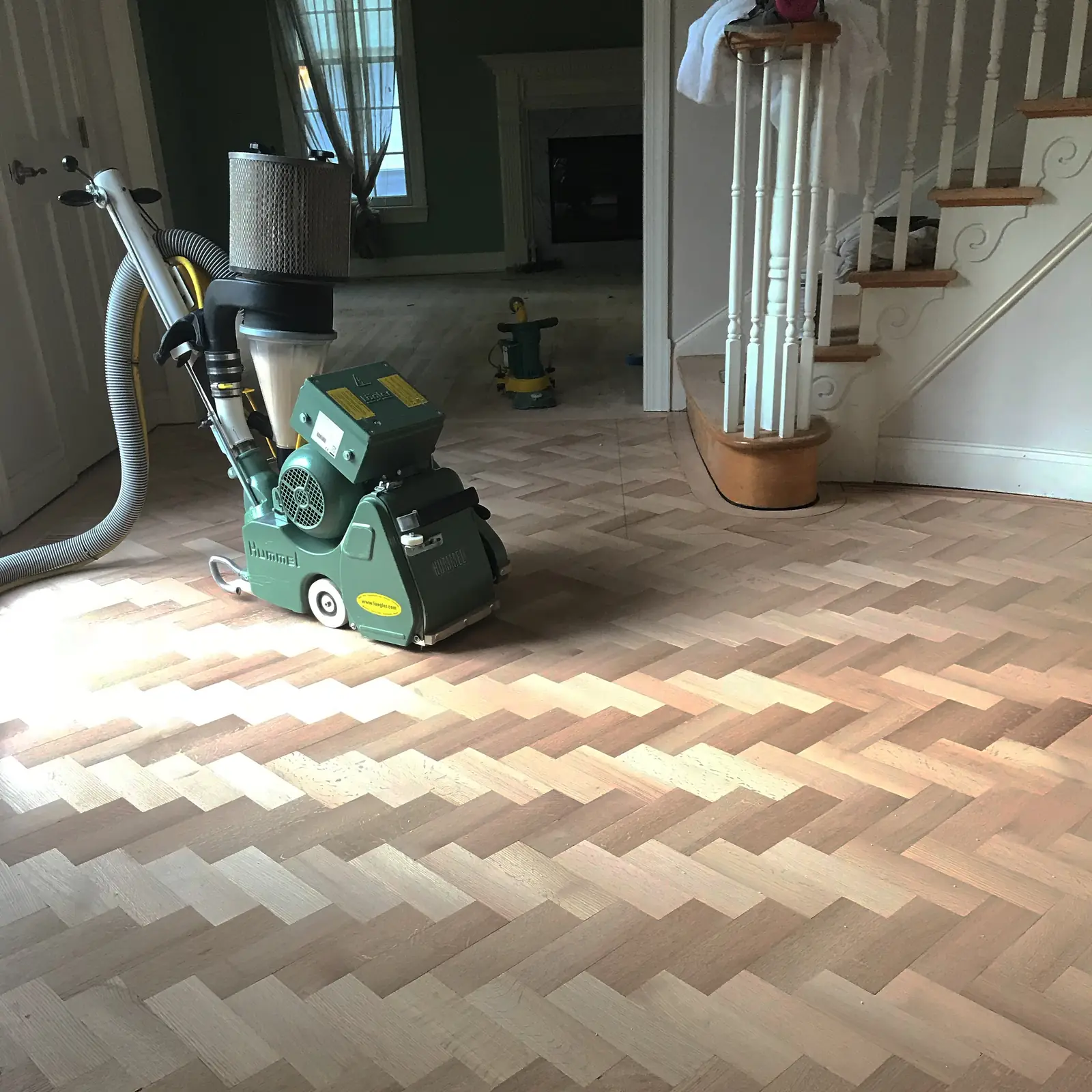 Classic herringbone pattern hardwood floor installation